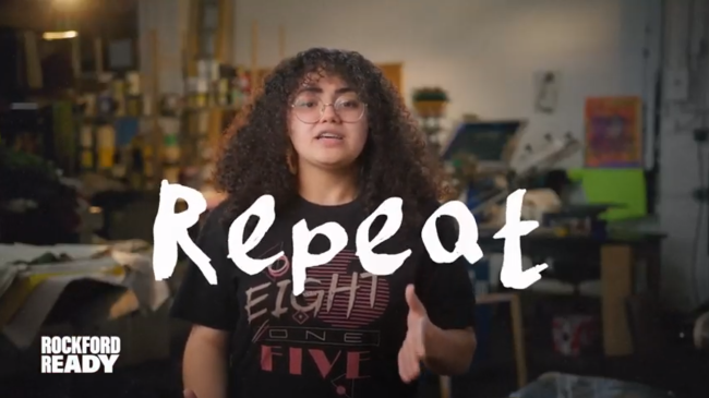 Video screenshot of teen speaking with the word "Repeat" overlayed